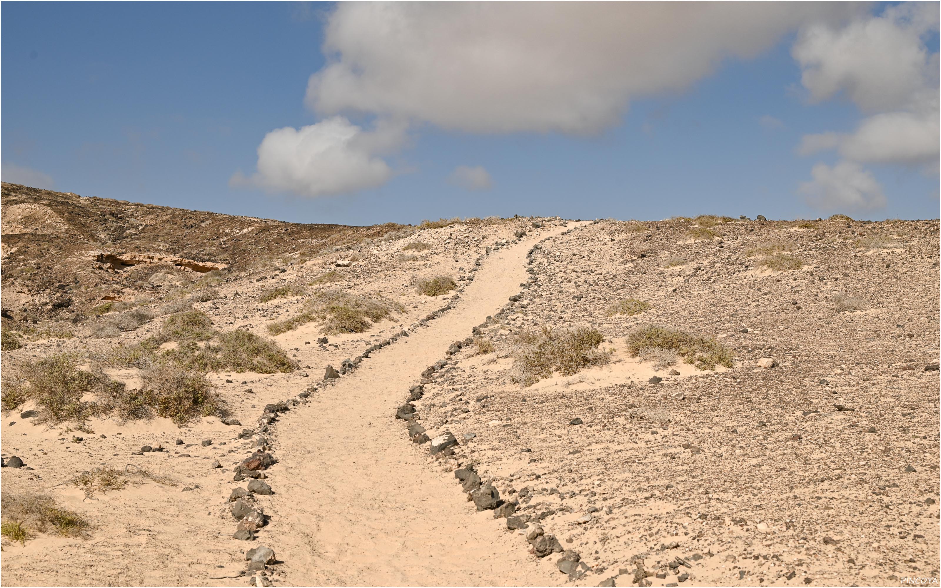 „Auf dem Weg um den Berg.“